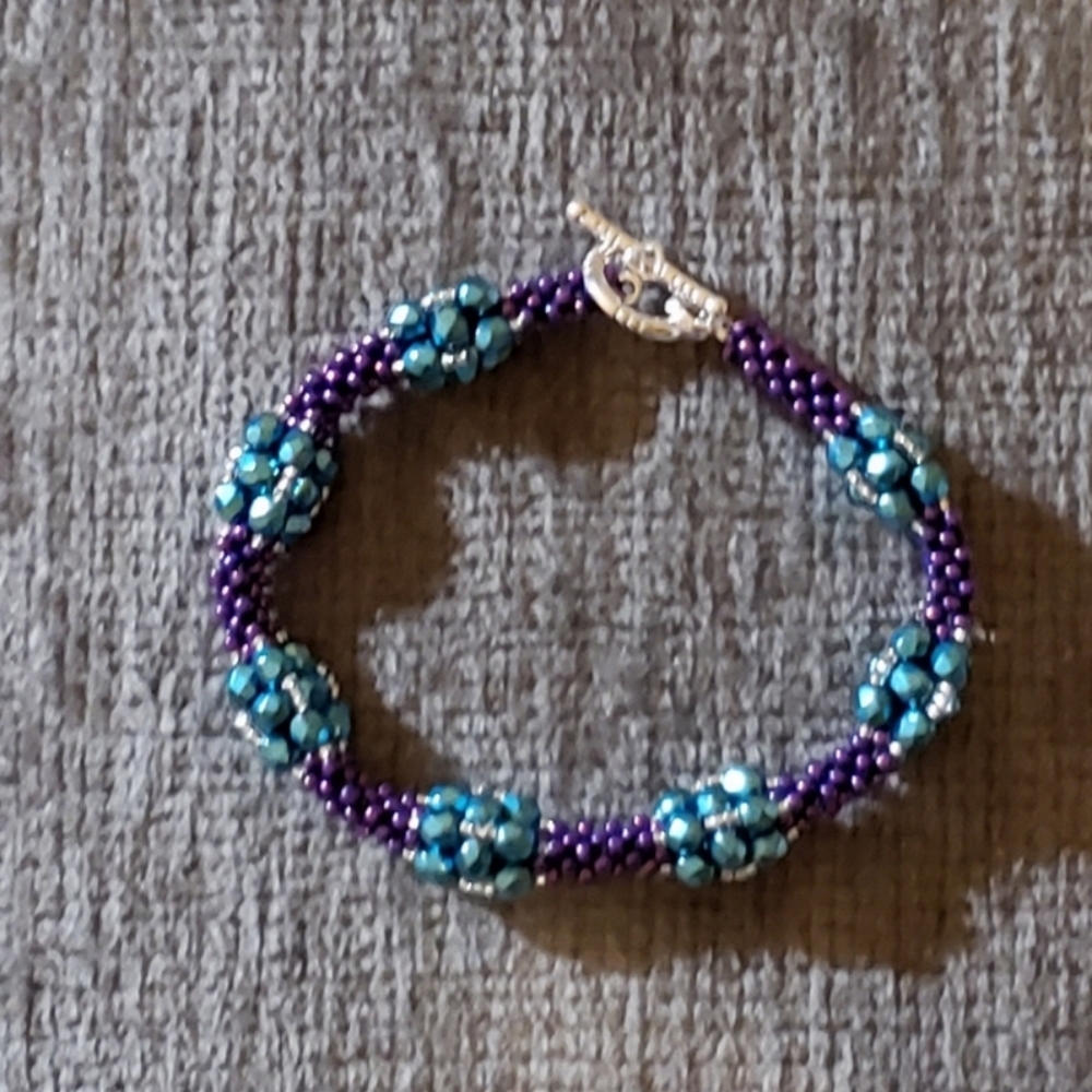 Purple and aqua bead woven jeweled Bracelet